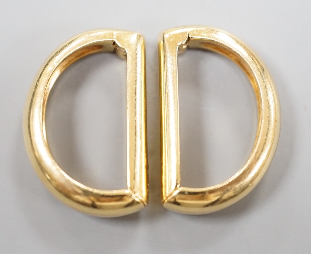 A modern pair of Cartier 750 yellow metal demi-lune cufflinks, each numbered 659650, 24mm, 12.5 grams, in Cartier pouch.